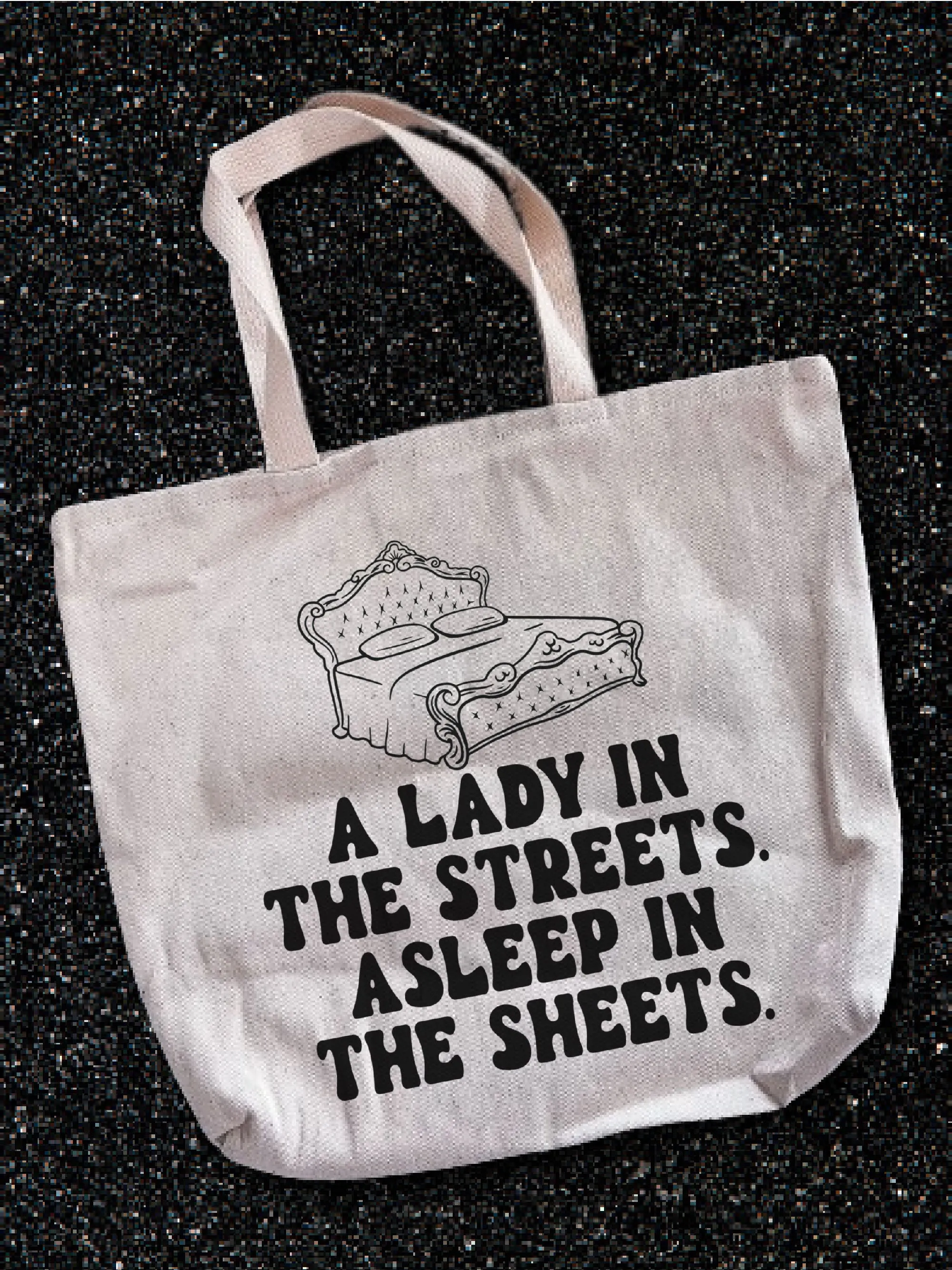 A Lady In The Streets. Asleep In The Sheets. Tote Bag