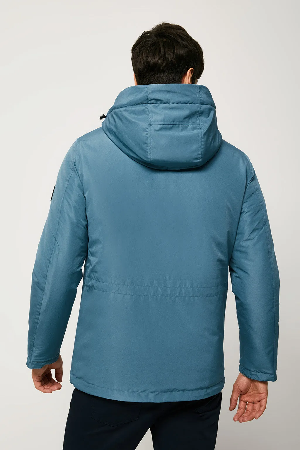 Parka azul petróleo apres ski con capucha y cuello elevado